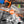Load image into Gallery viewer, NEXPOW 8" Mini Chainsaw - 24V Battery Powered Chainsaw, 2 Batteries & Chains, Cordless Handheld Chain Saw Wood Cutter, Orange
