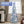 Load image into Gallery viewer, 7FT Snow Flocked Pre-lit Artificial Pop Up Christmas Tree with 200 Warm Lights and Blue &amp; Silver Ornaments for Home Holiday Decor
